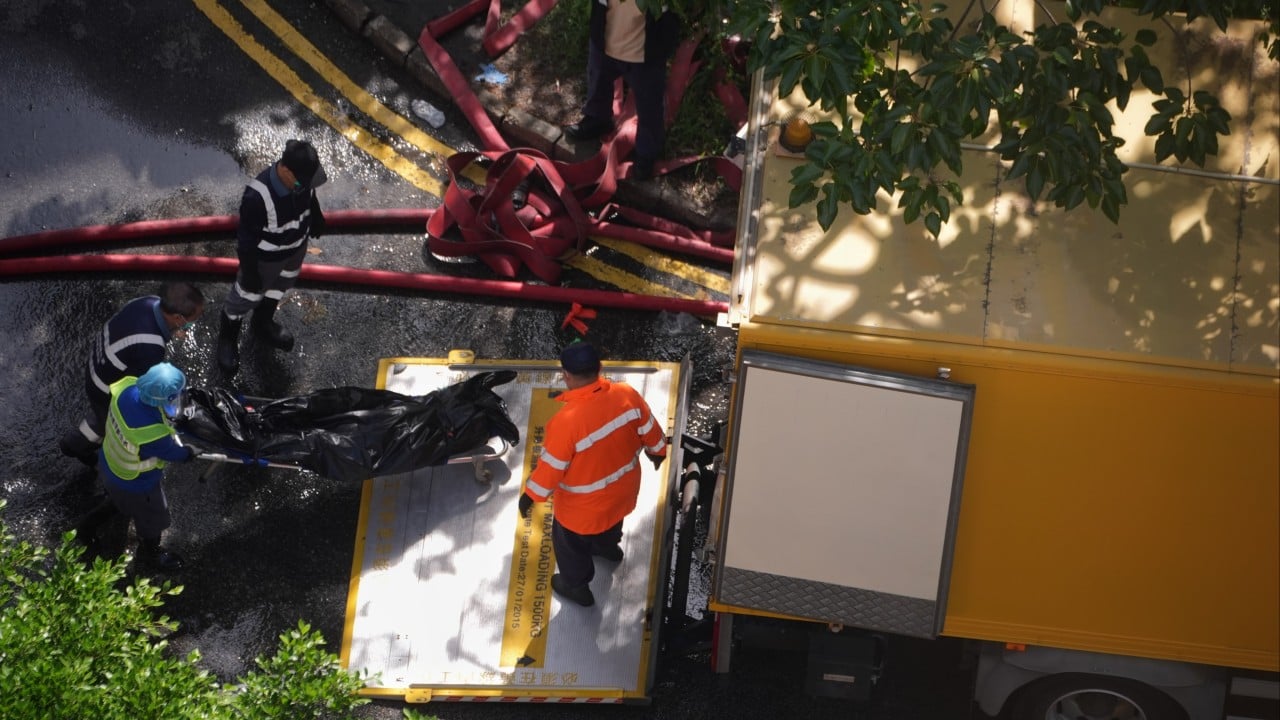โShe kept crying for me to rescue herโ: victimsโ families mourn fallen in Hong Kong
